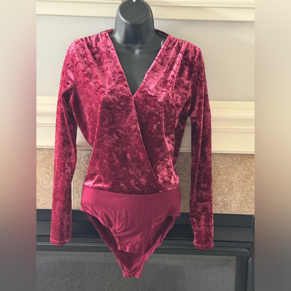 Velvet-like bodysuit.